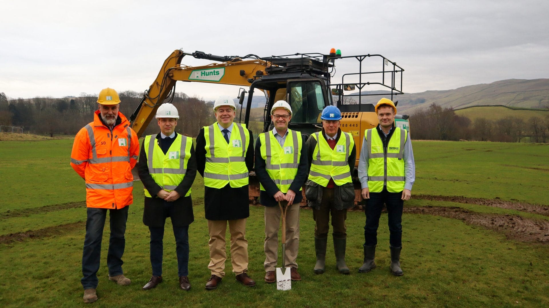 A group photo of staff as work commences