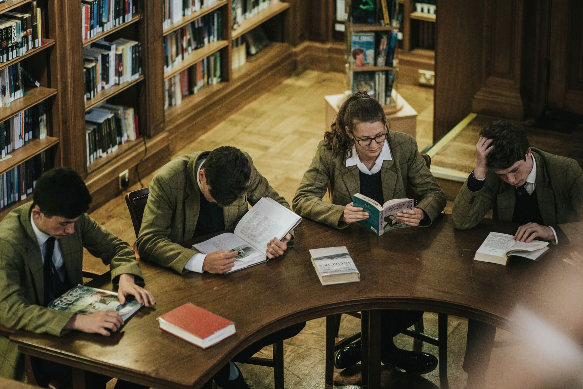 Pupils reading in the library